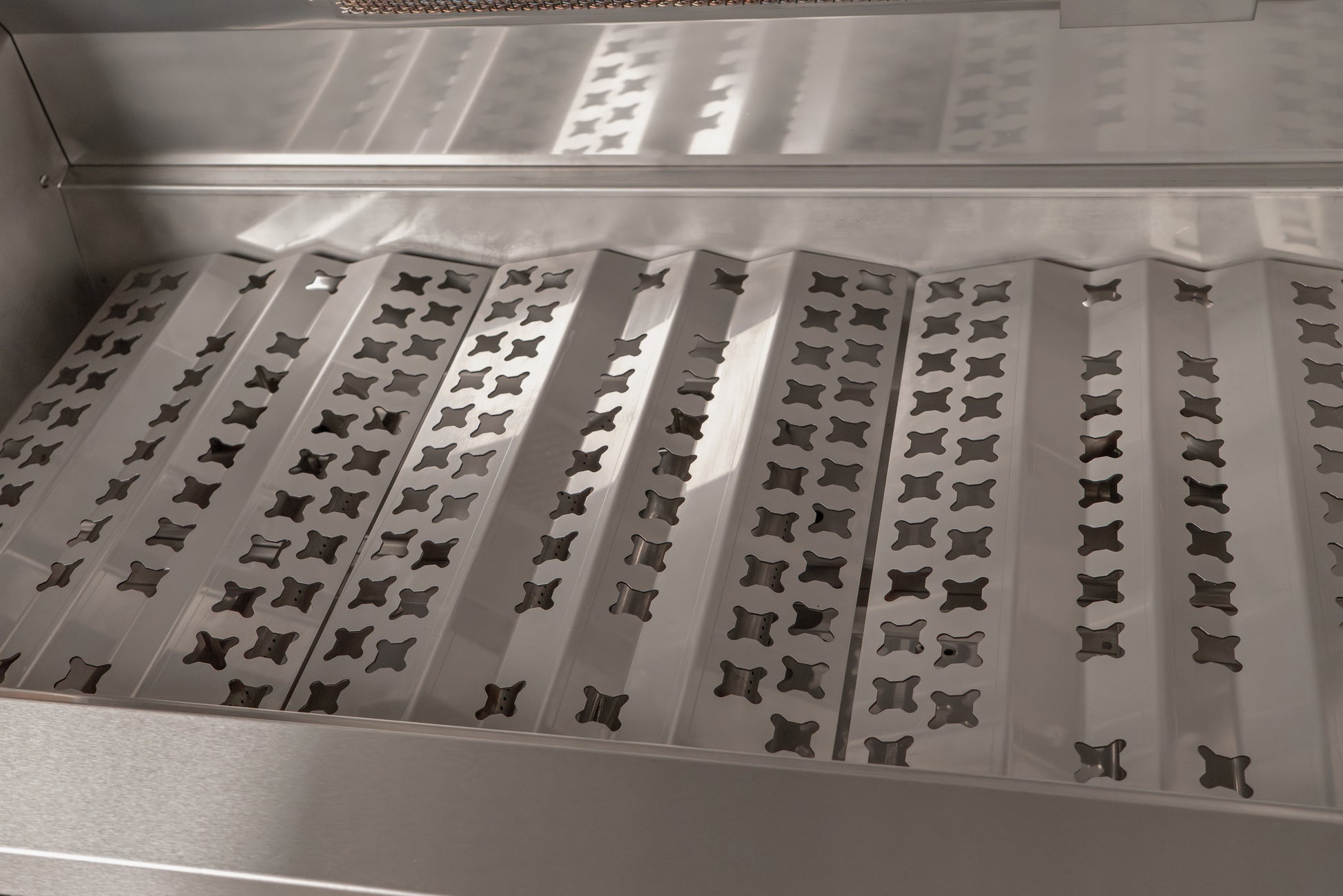 the aog stainless steel flavor grids / vaporizer panels. These catch the grease from the cooking grids. These take the beating on any grill. These will catch the grease and try to burn it off before it hits the burners.